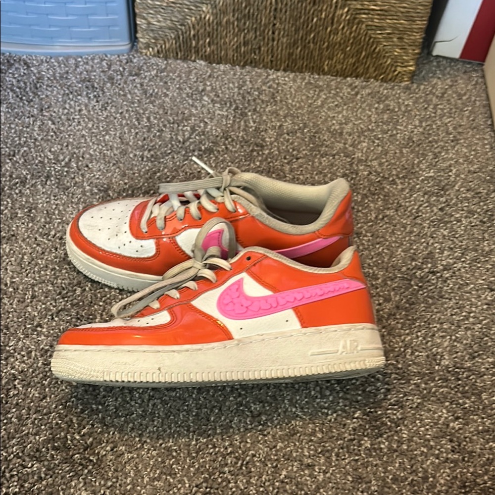 Nike Pink and Red Sneakers Iconic Style